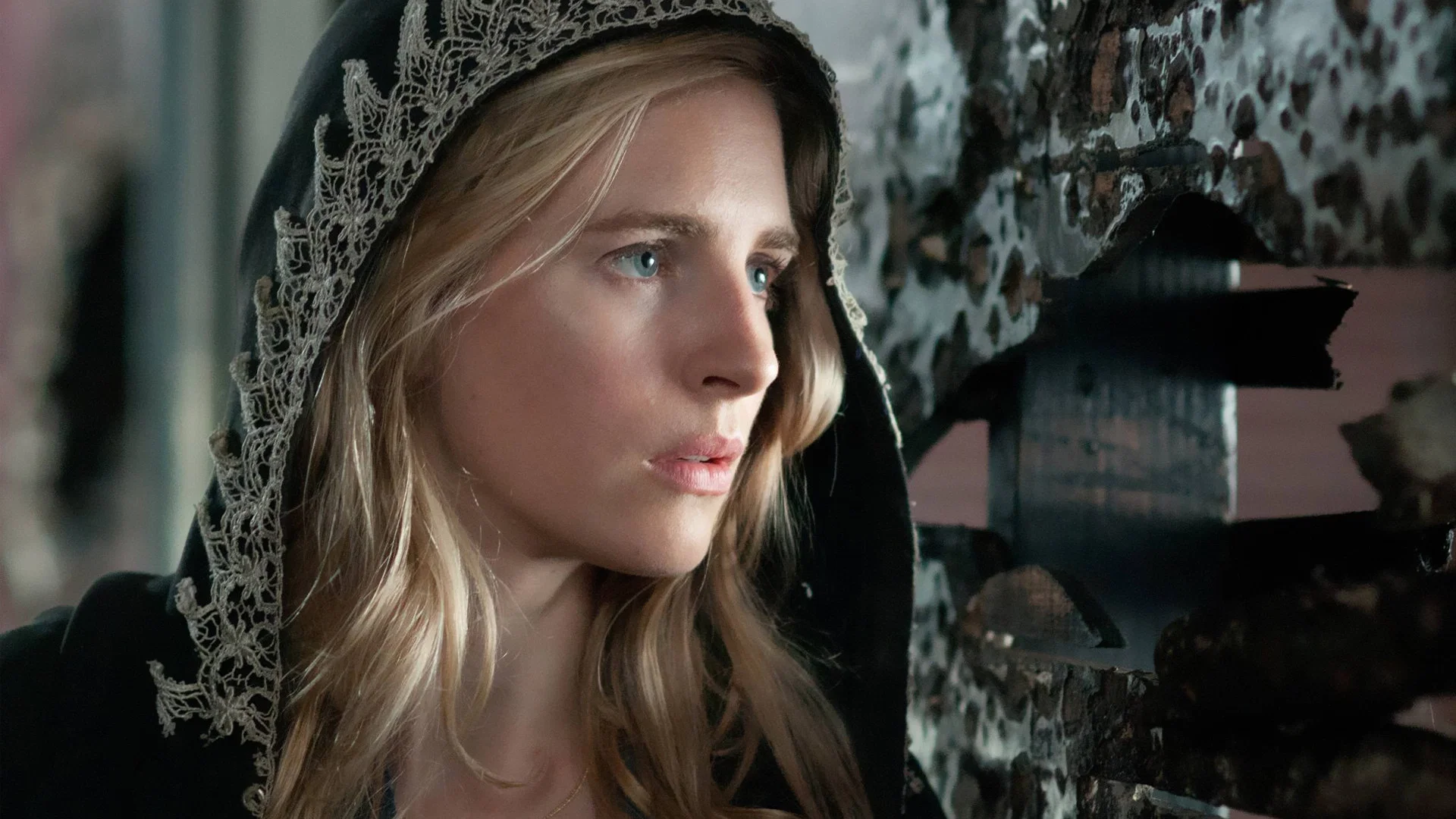Prairie Johnson, played by Brit Marling, wearing a dark hood in The OA